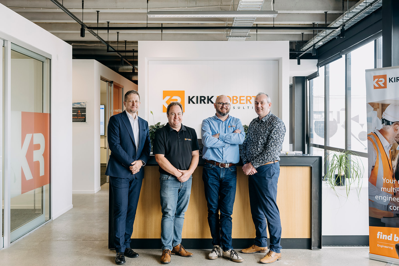 Image of 4 Kirk Roberts managers in the reception of the Christchurch office