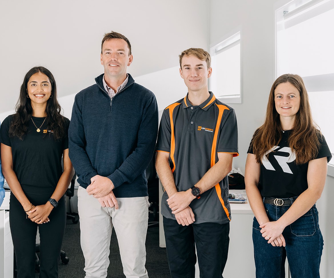 4 team members in an office